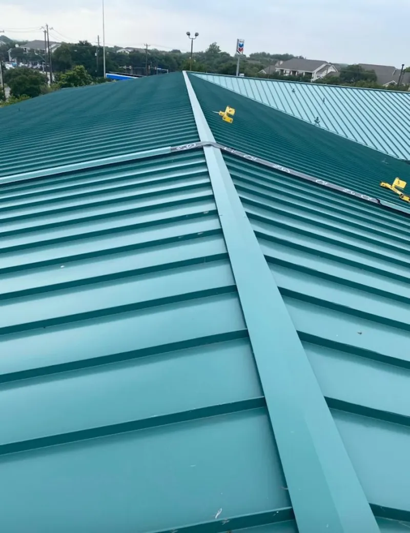 Green commercial metal roof ridge and valley for Metal Roof Repair in South Laurel